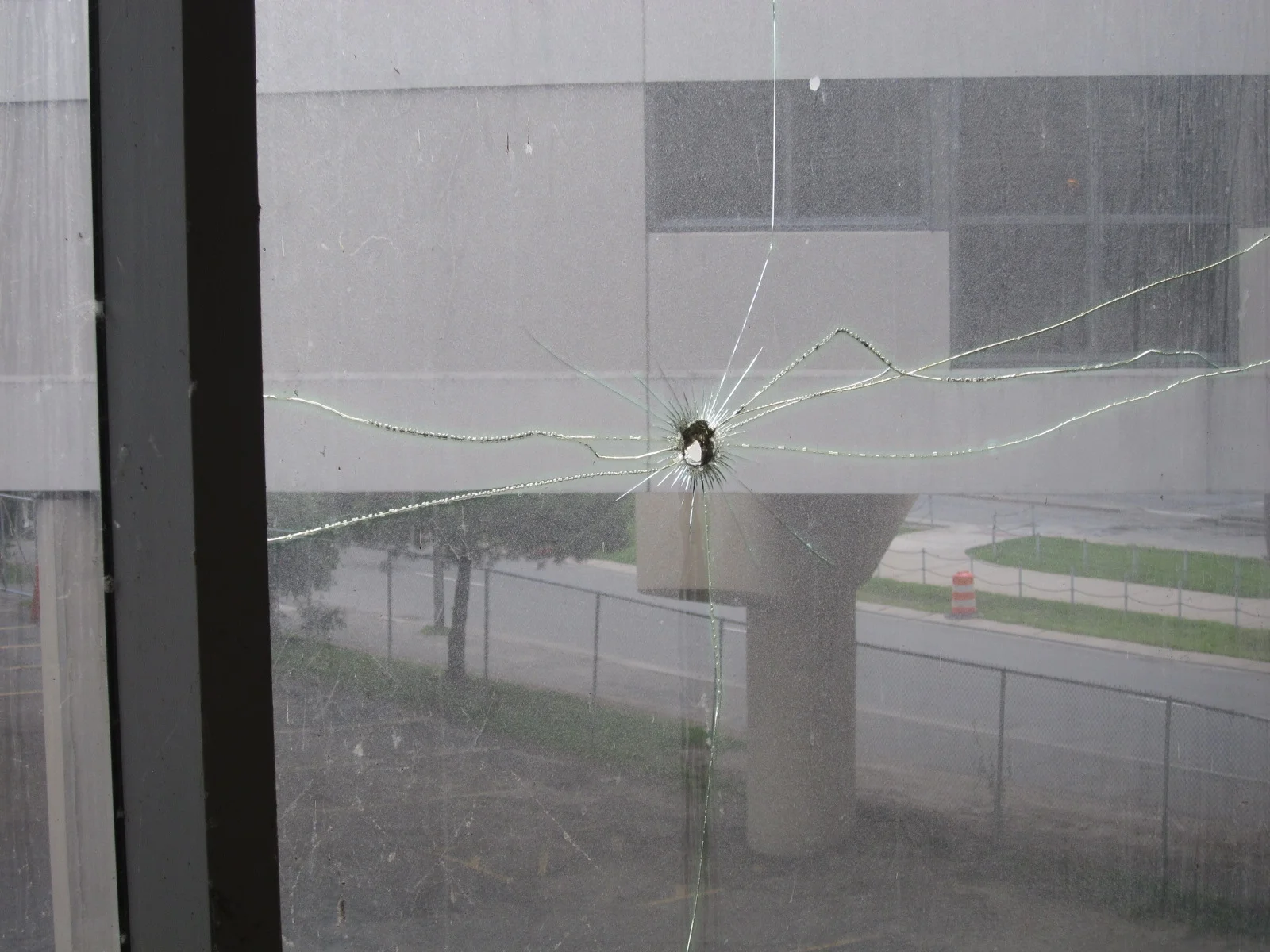 Pretty sure that is a bullet hole.