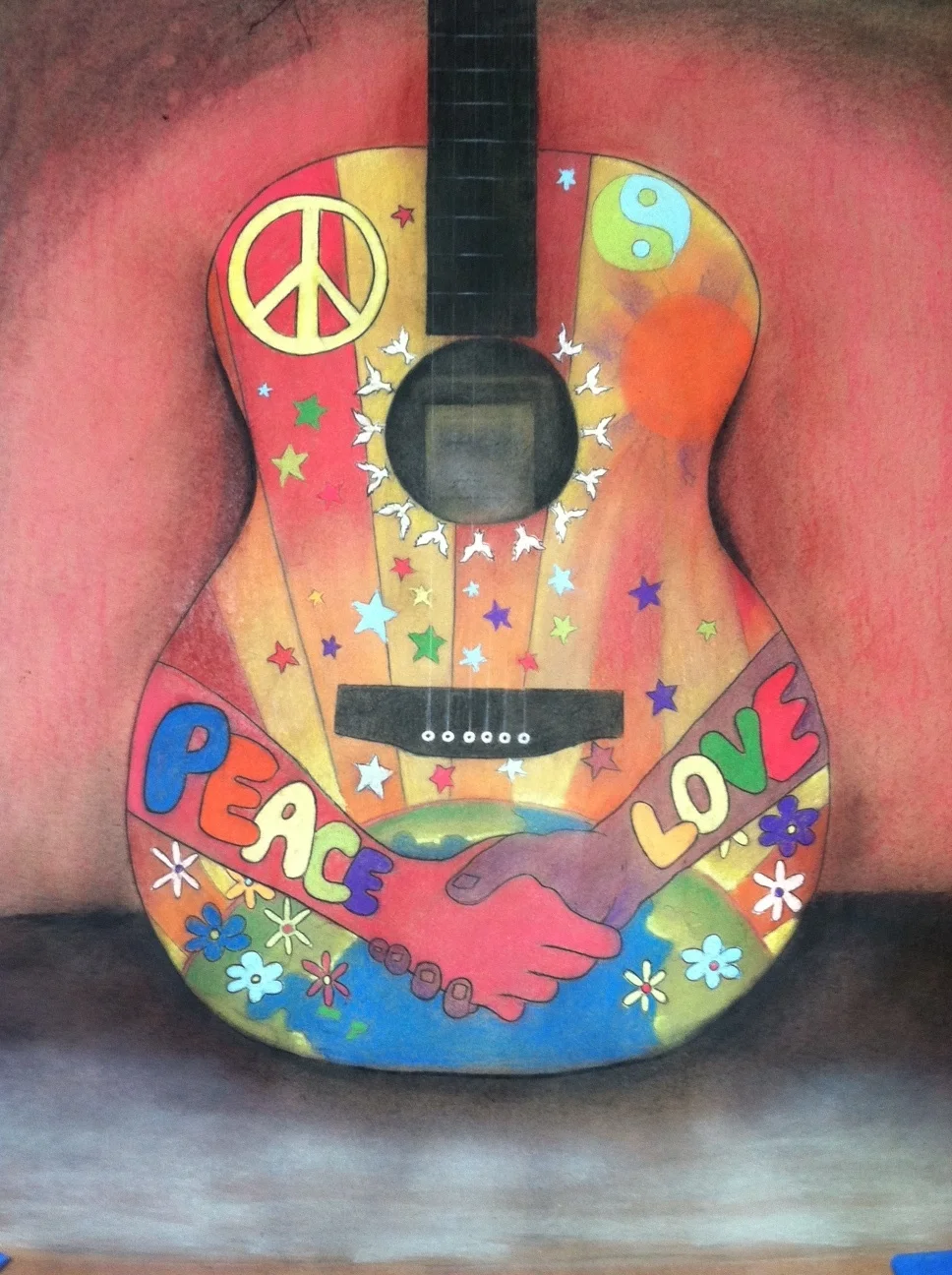 The "Peace Love Guitar" raised over $4,000 for a fundraiser hosted by the Front Row Foundation. Beyond these individual off-site fundraisers, each artist involved at a Second Friday showcase donates a piece to benefit a different charitable organization.