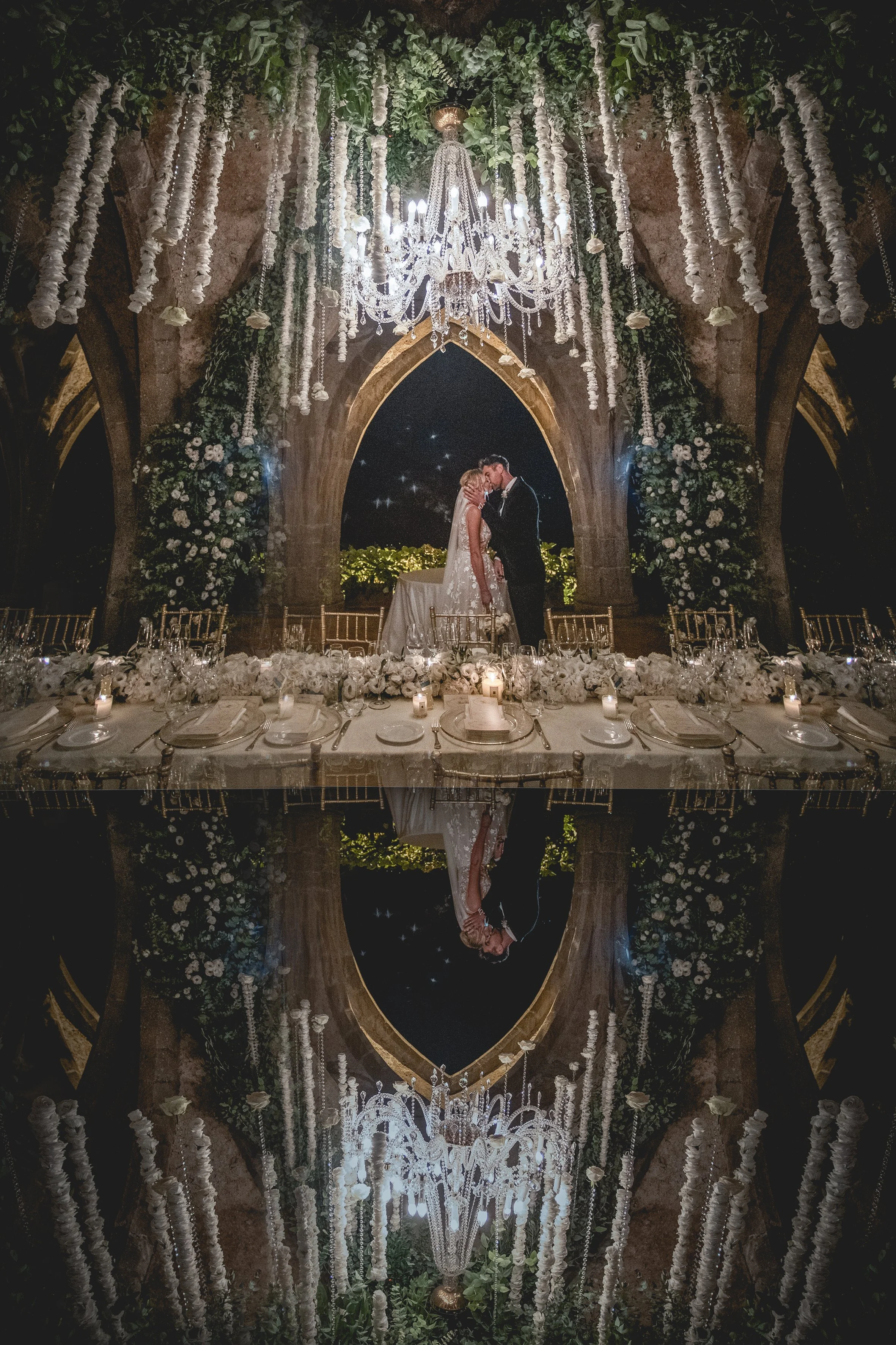 Husband and wife kissing at a magical wedding in Italy