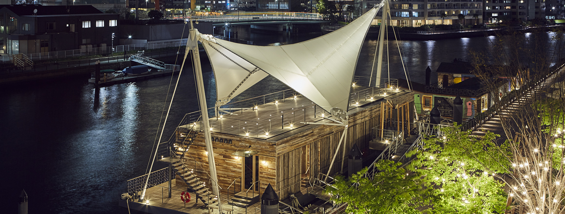 TERRADA's event space T-Lotus appears to be floating on the water.