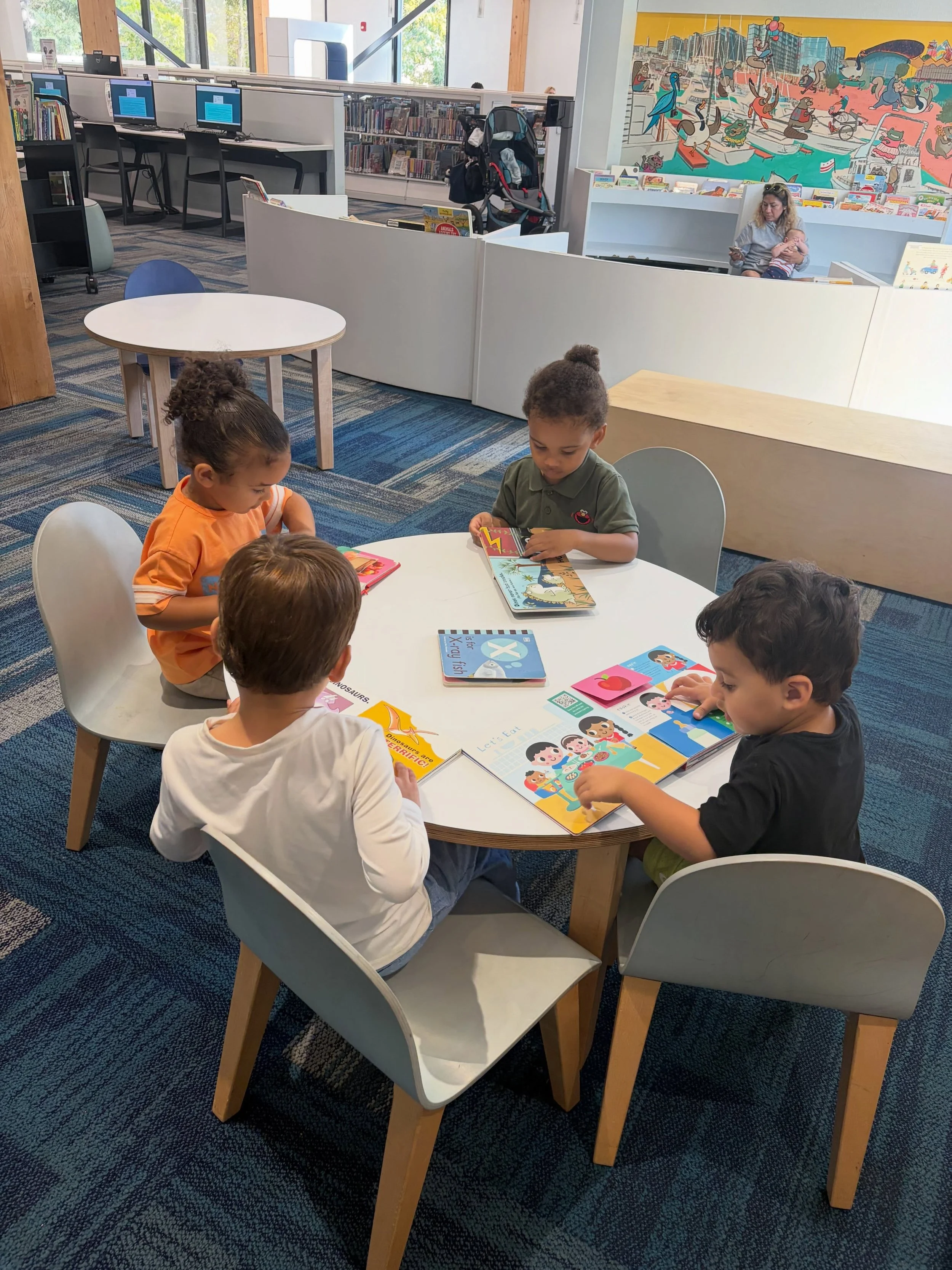 Taking children to the local library builds early language skills, encourages social interaction, and provides access to a wide variety of developmental resources. #Montessori #MSOW #Montessorischoolofwashington #library #childrenarethefuture