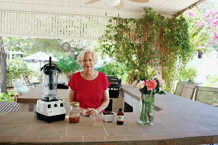 My momma - Kathleen Waite - getting ready to make Almond Milk - isn't she cute?