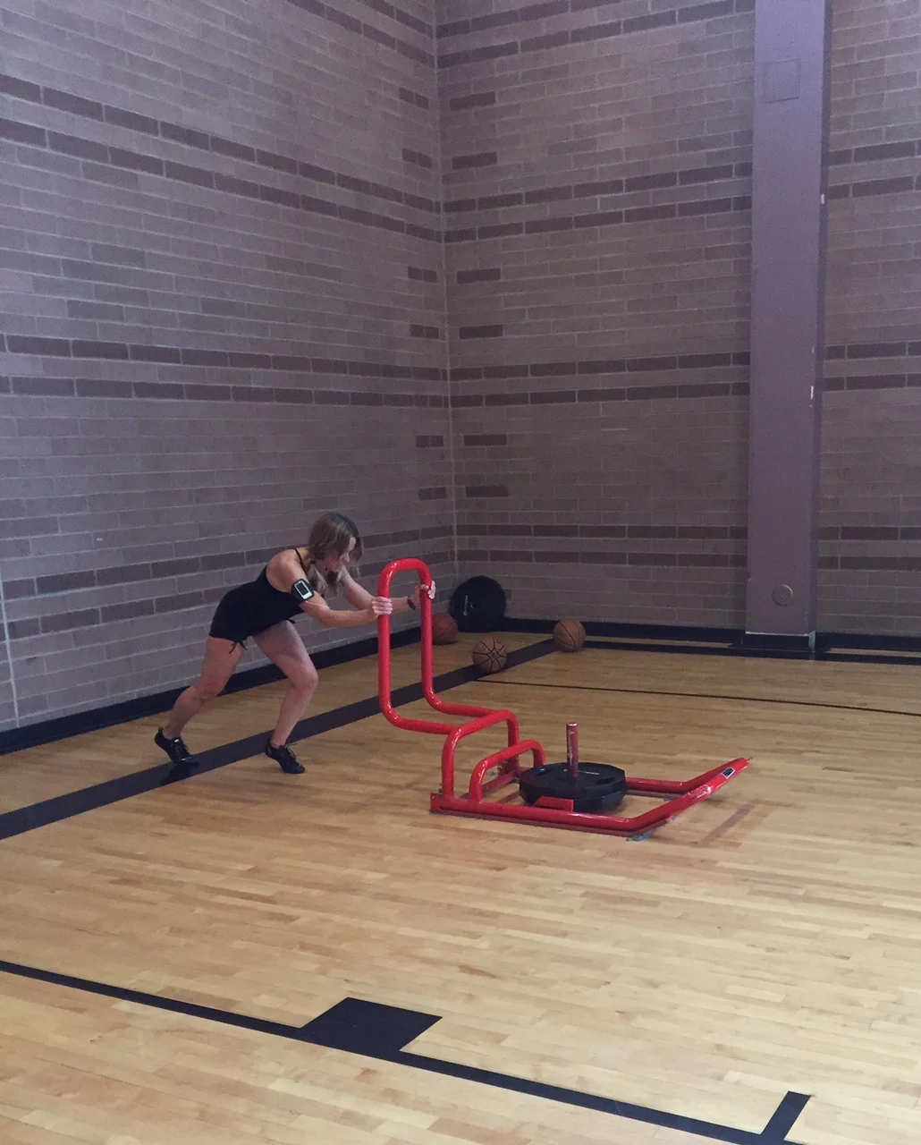 Sled Push with 90 lbs. - add in more weight to add challenge.