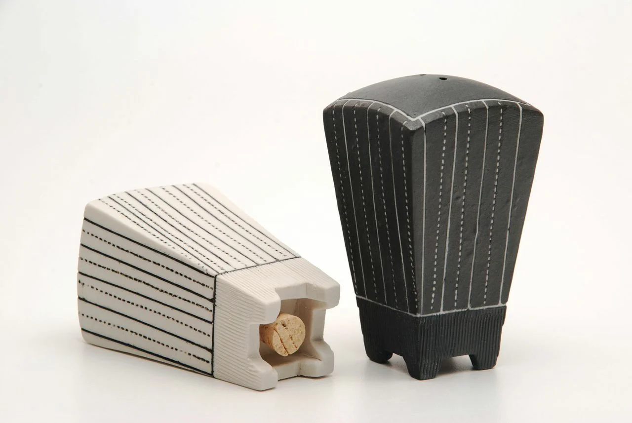 Doug Peltzman, Salt & Pepper, 2.75”x2.75”x3.75”, ”, High fired hand-built black and white porcelain with inlaid slip, fired to cone 8 in an electric kiln, 2014. 
