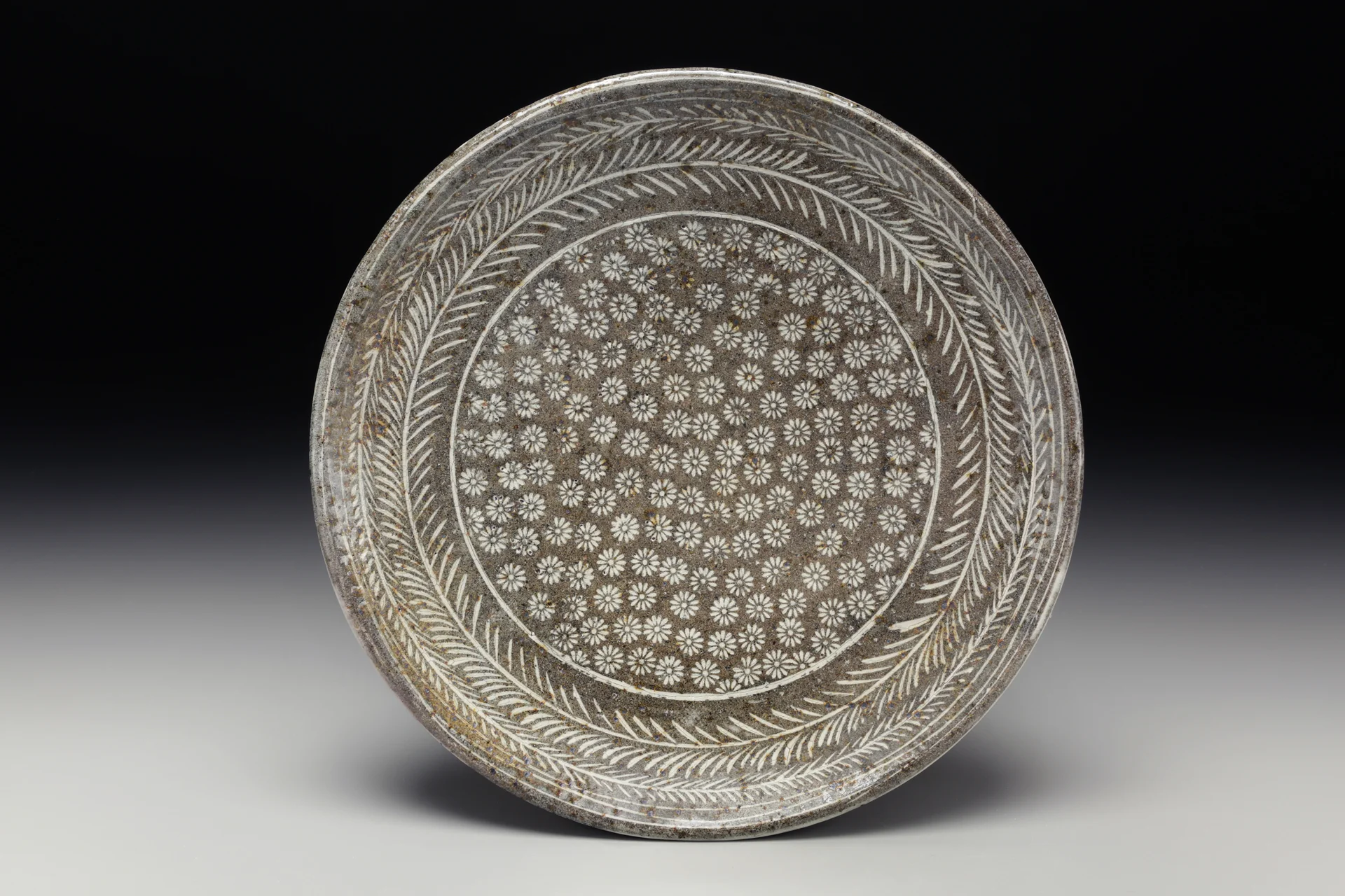 Michael Kline, Platter, 2015, native NC thrown with stamped impressions and white slip inlay, cone 10, 15''