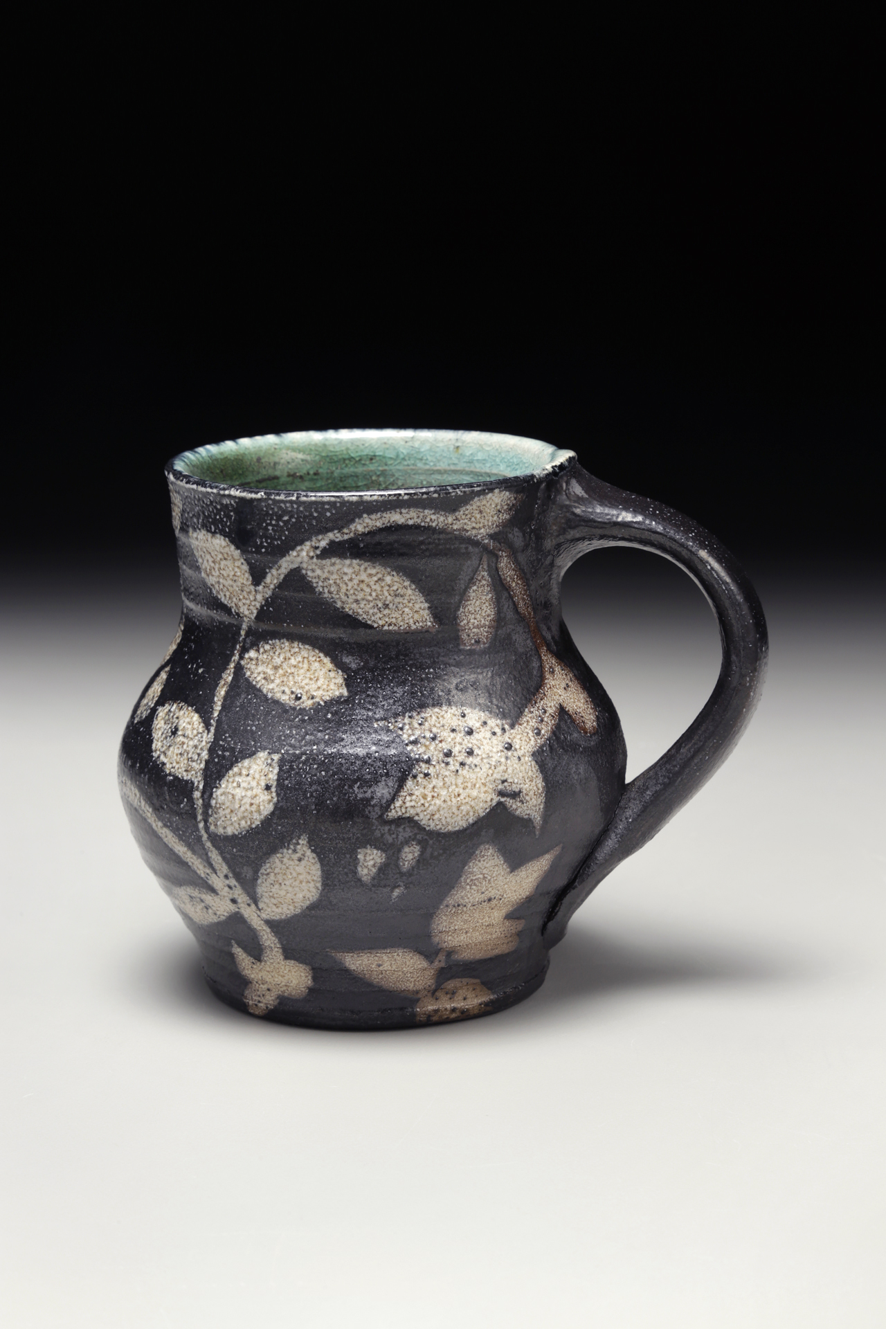 Michael Kline, Mug, 2015, thrown NC native clay, wax resist brushwork, 4''