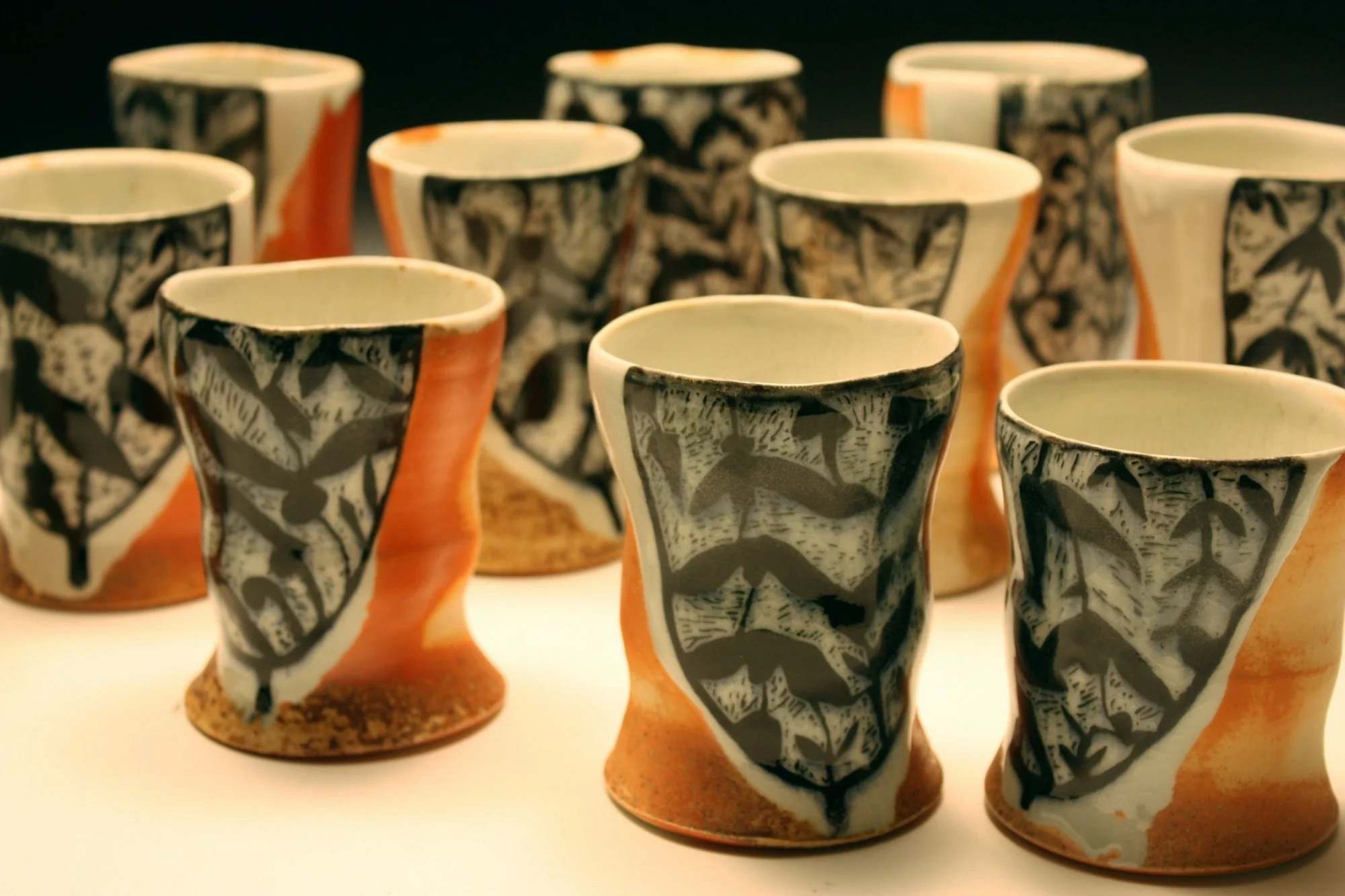 Bruce Dehnert, porcelain, glaze/flashing slip, wood fired