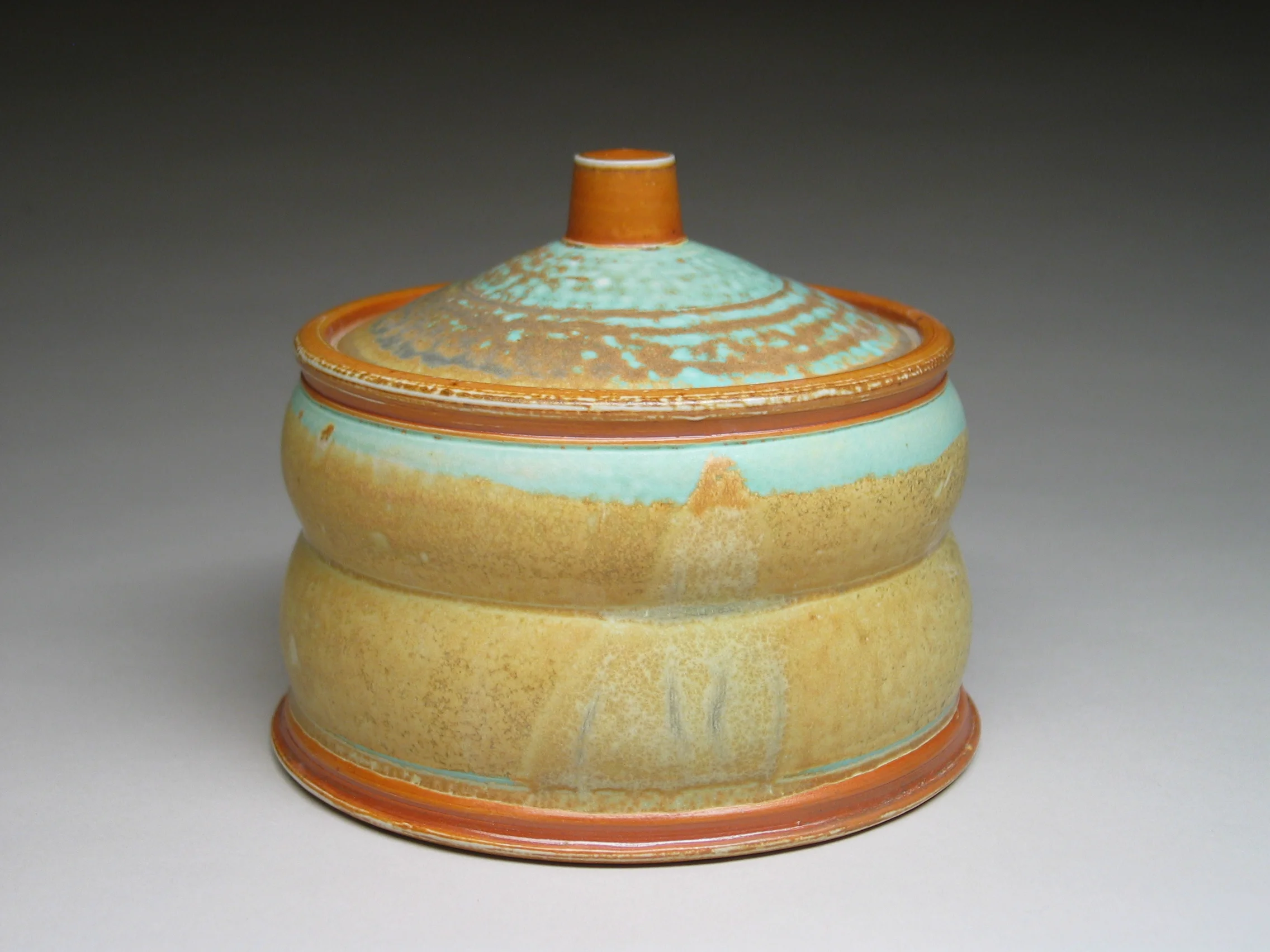 Tyler Gulden, Lidded Jar, Porcelain, wheel thrown, salt & soda fired cone 11, wax resist and applied glaze, 5.5x7.5, 2016