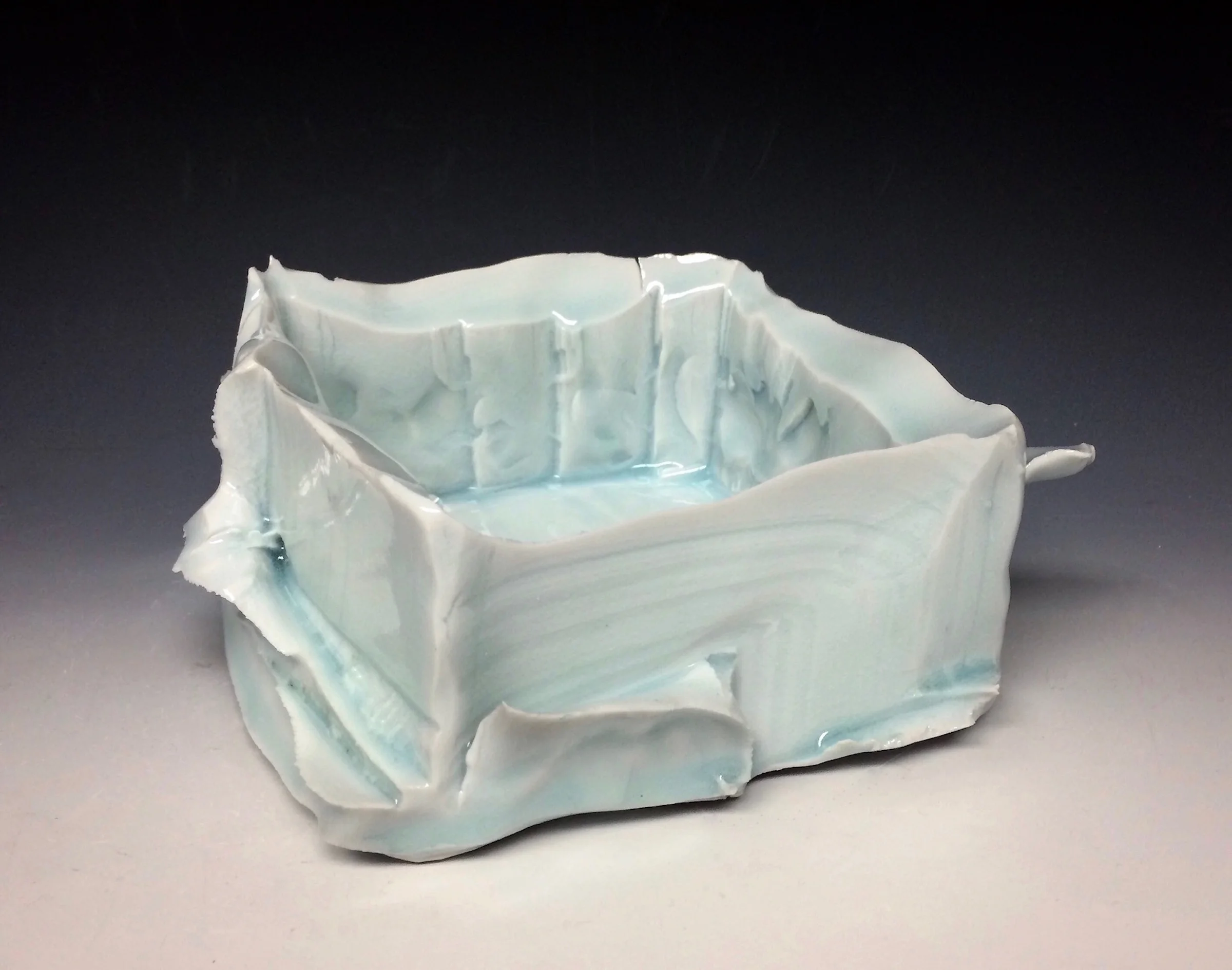 John Oles, Celadon Box, Carved porcelain with celadon glaze, cone 11 reduction, 3.5x5x5, 2016