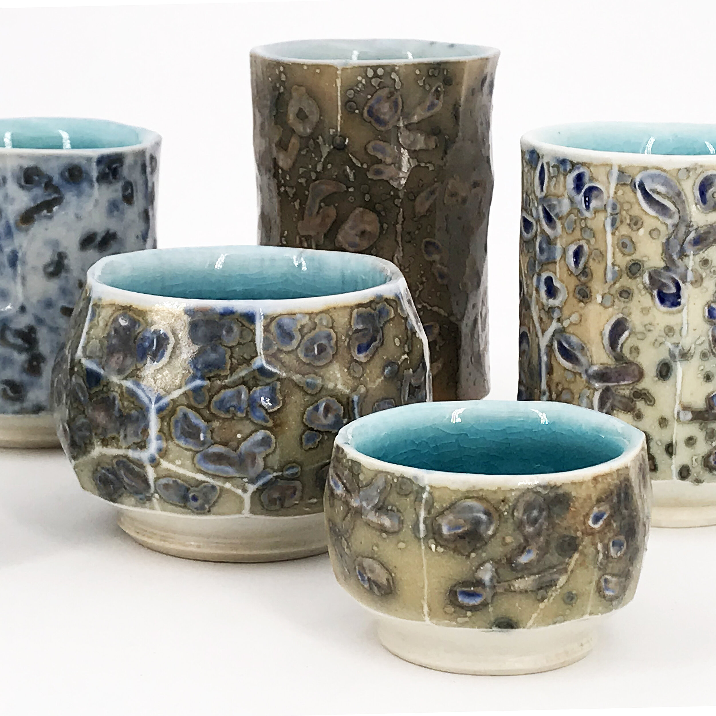 Shapiro10faceted porc cup group.jpg