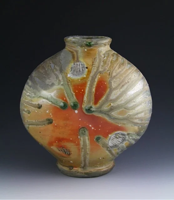 Troy 9-Eyed Bottle.jpeg