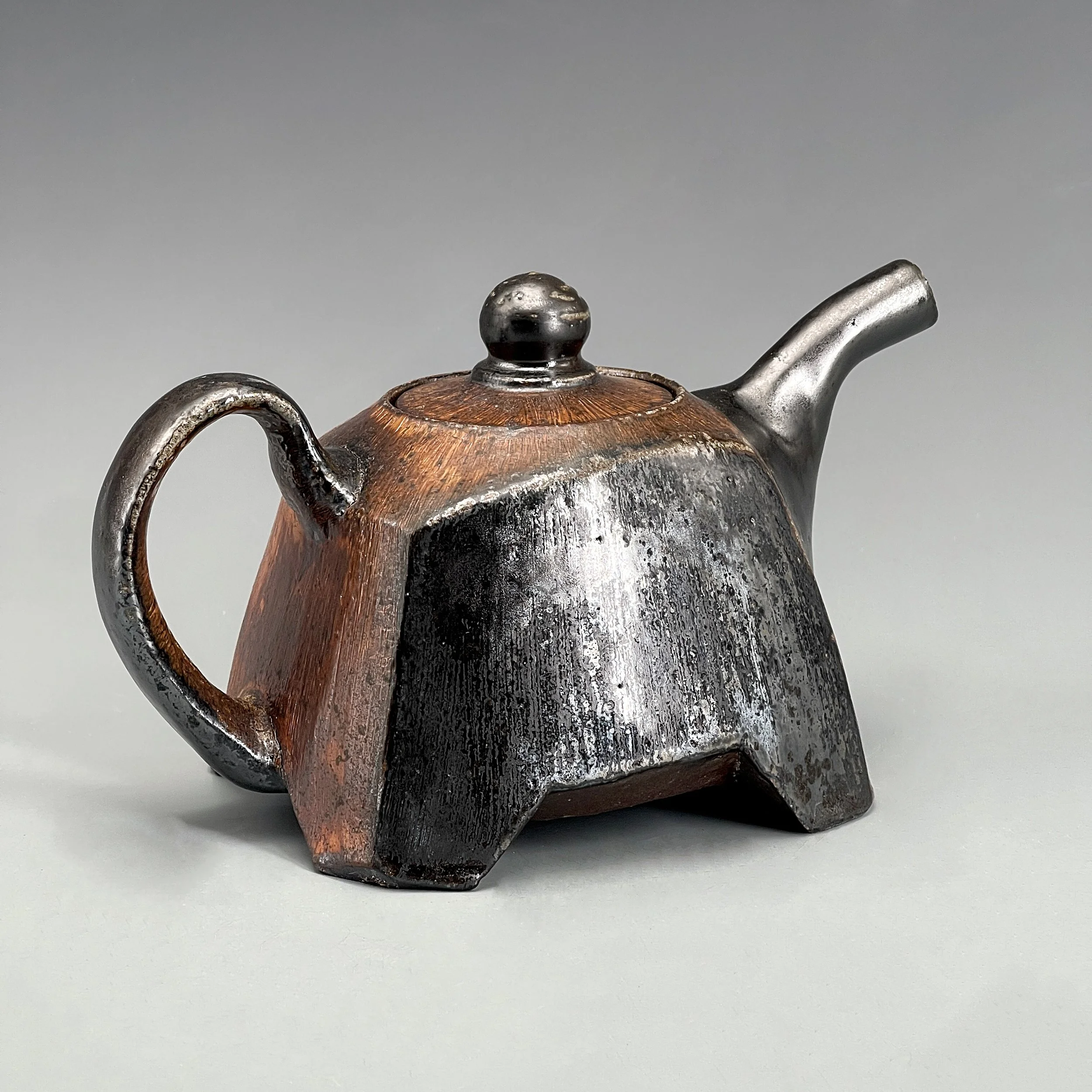 Shapiro footed stoneware teapot balck panel.jpg