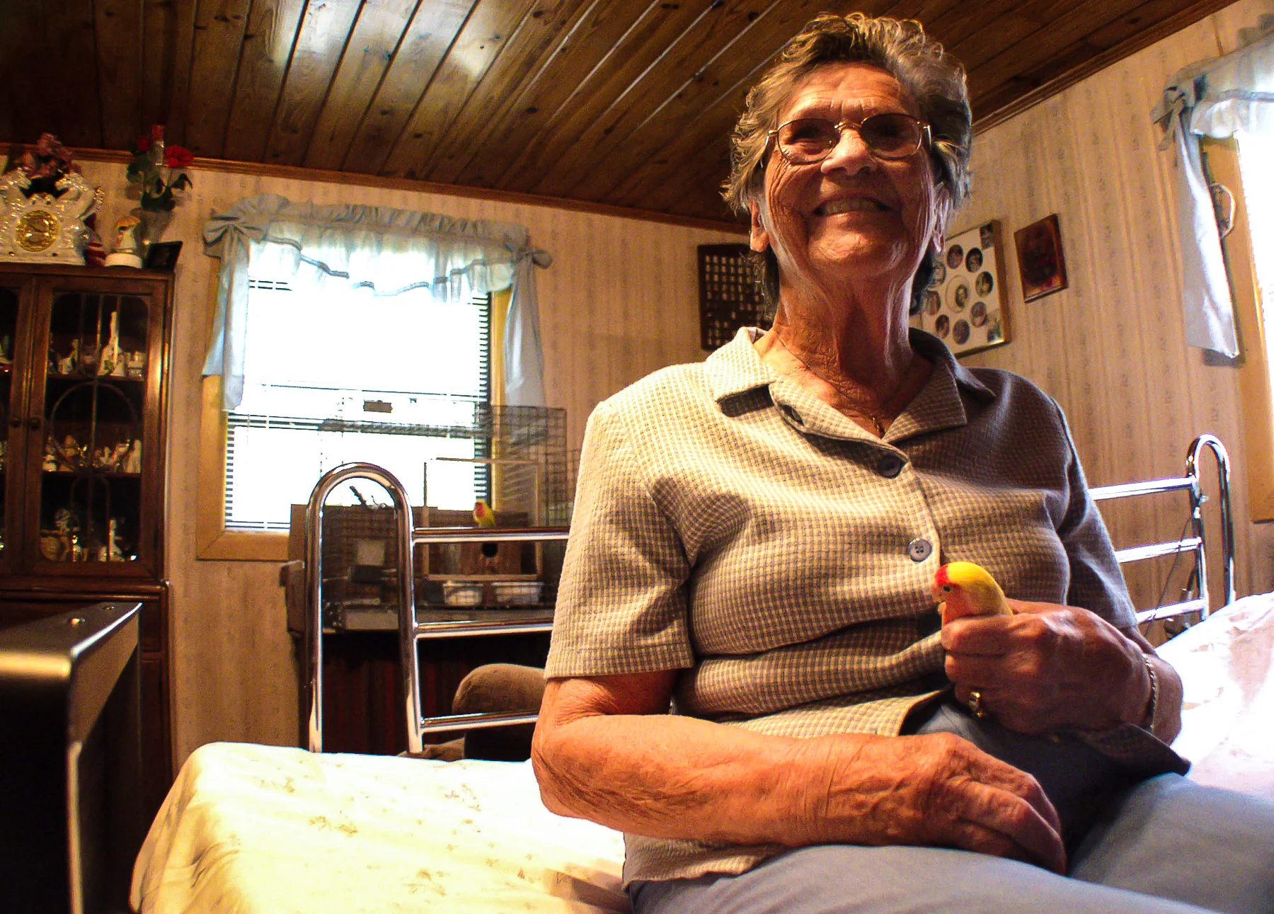  AlzheimerÕs Companion: Lutino lovebird Peaches keeps Mattie Florence company in her bedroom of the house where she lives with her daughter, Pat Williams, and other family members. Florence, 80, has AlzheimerÕs disease, and her family insists on taki