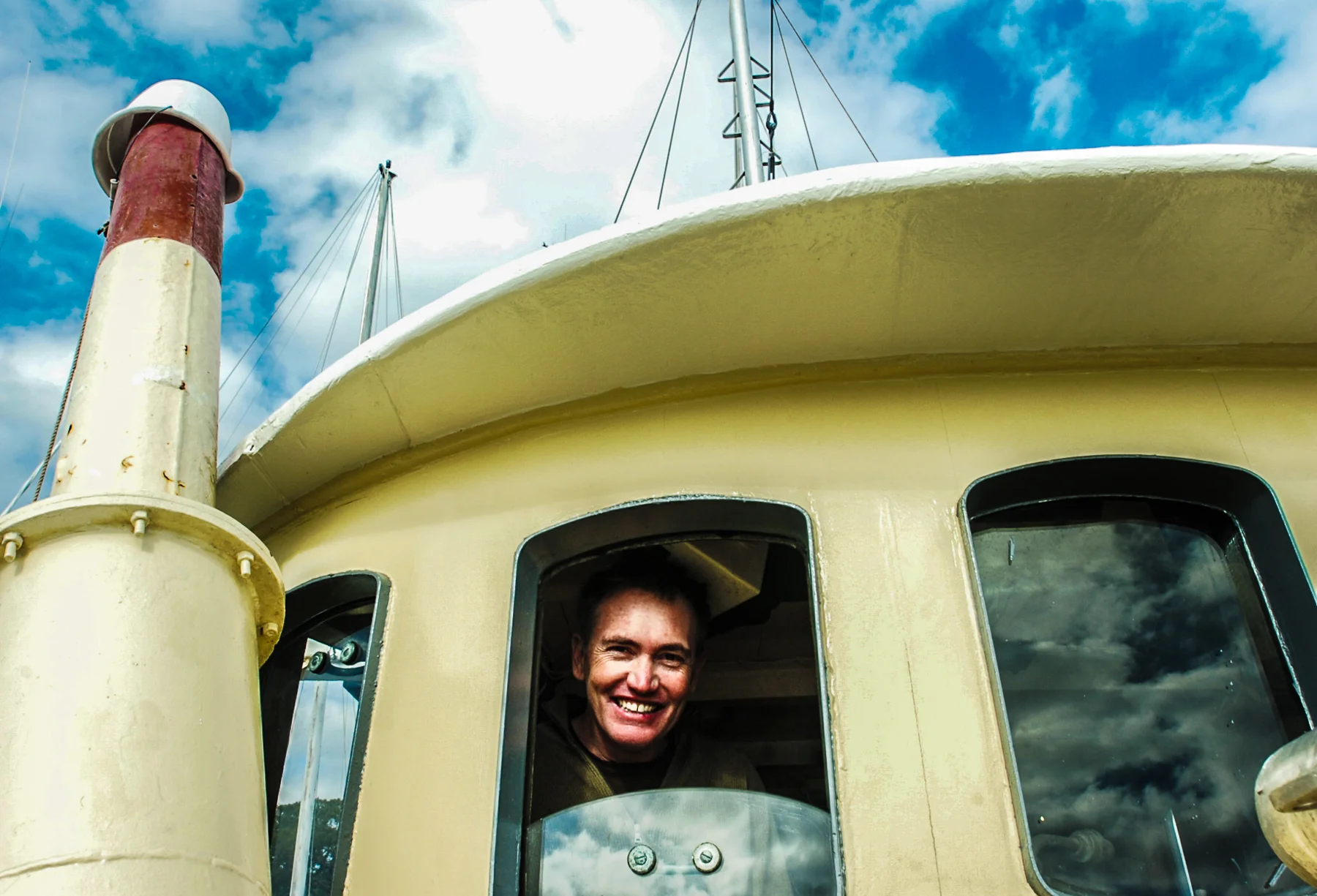  Eric Smith pokes his head out of the wheel house of Discoverer Ketty Lund docked on the San Sebastian River on December 8, 2006. Photo by MADELYN TROYANEK, madelyn.troyanek@staugustinerecord.com 