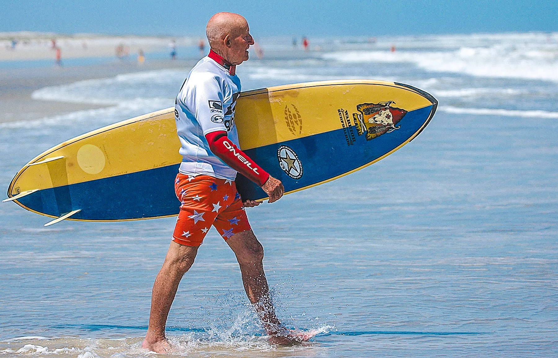  Grand Legends competitor Howie Lyon, 82, of St. Augustine takes to the waves while at the Eastern Surfing Association's Southeastern Regional on Saturday, April 10, 2005. Lyon is the oldest competing surfer in the ESA. Photo by MADELYN TROYANEK, mad
