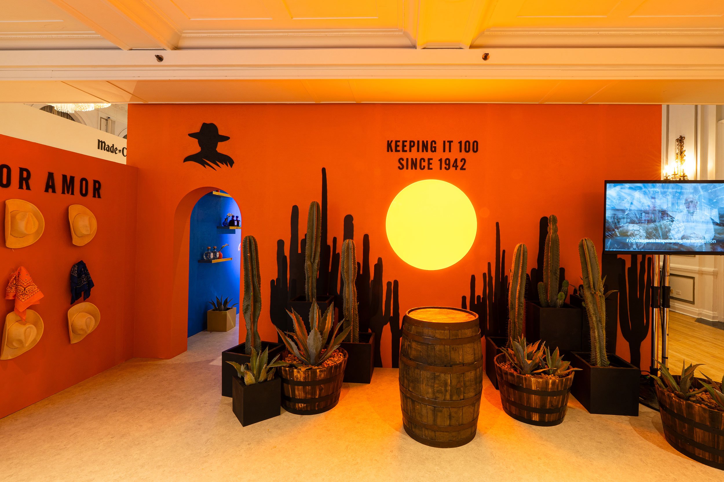 Don Julio branded tasting room fabricated by McWood for World Class 2025, featuring custom wall finishes, illuminated signage, premium display elements, and immersive hospitality branding.