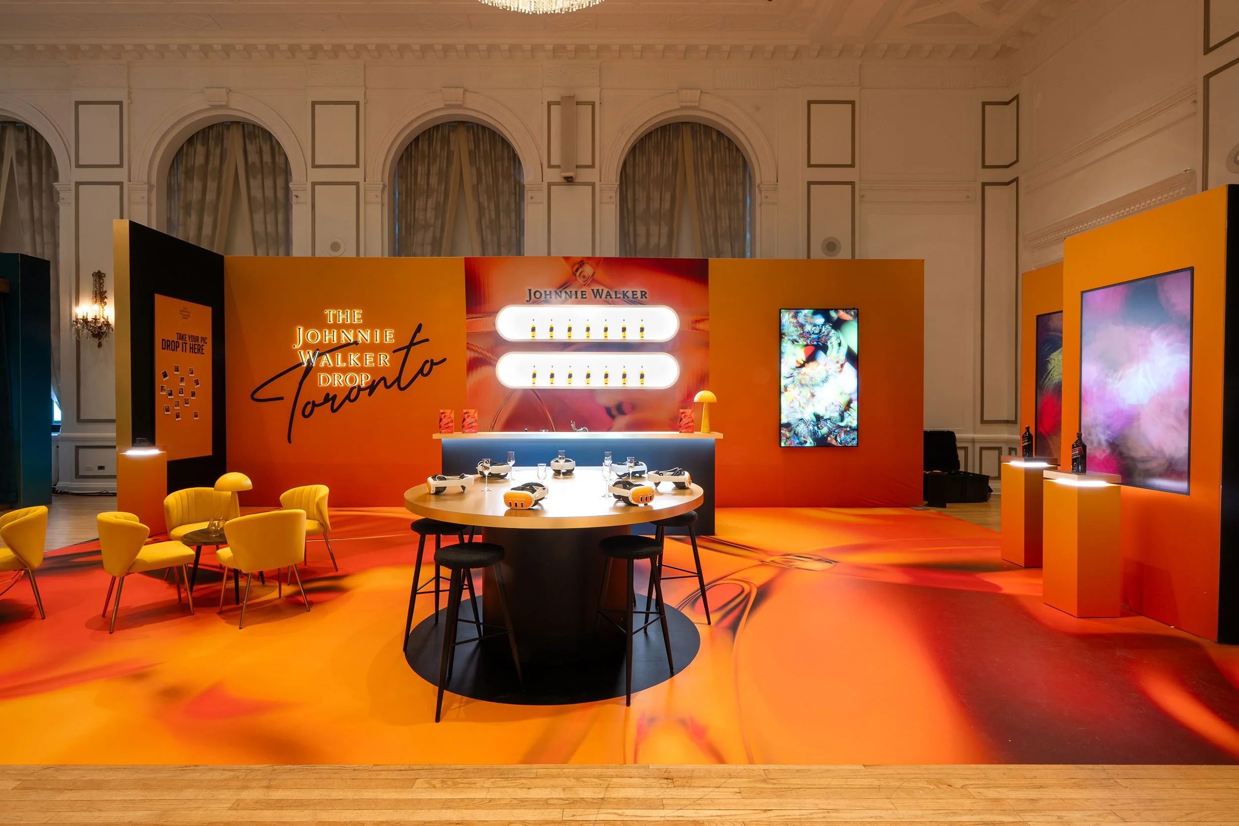Johnnie Walker branded environment fabricated by McWood for World Class 2025, featuring custom architectural finishes, illuminated signage, branded graphics, and a premium hospitality experience at Toronto's Fairmont Royal York Hotel.
