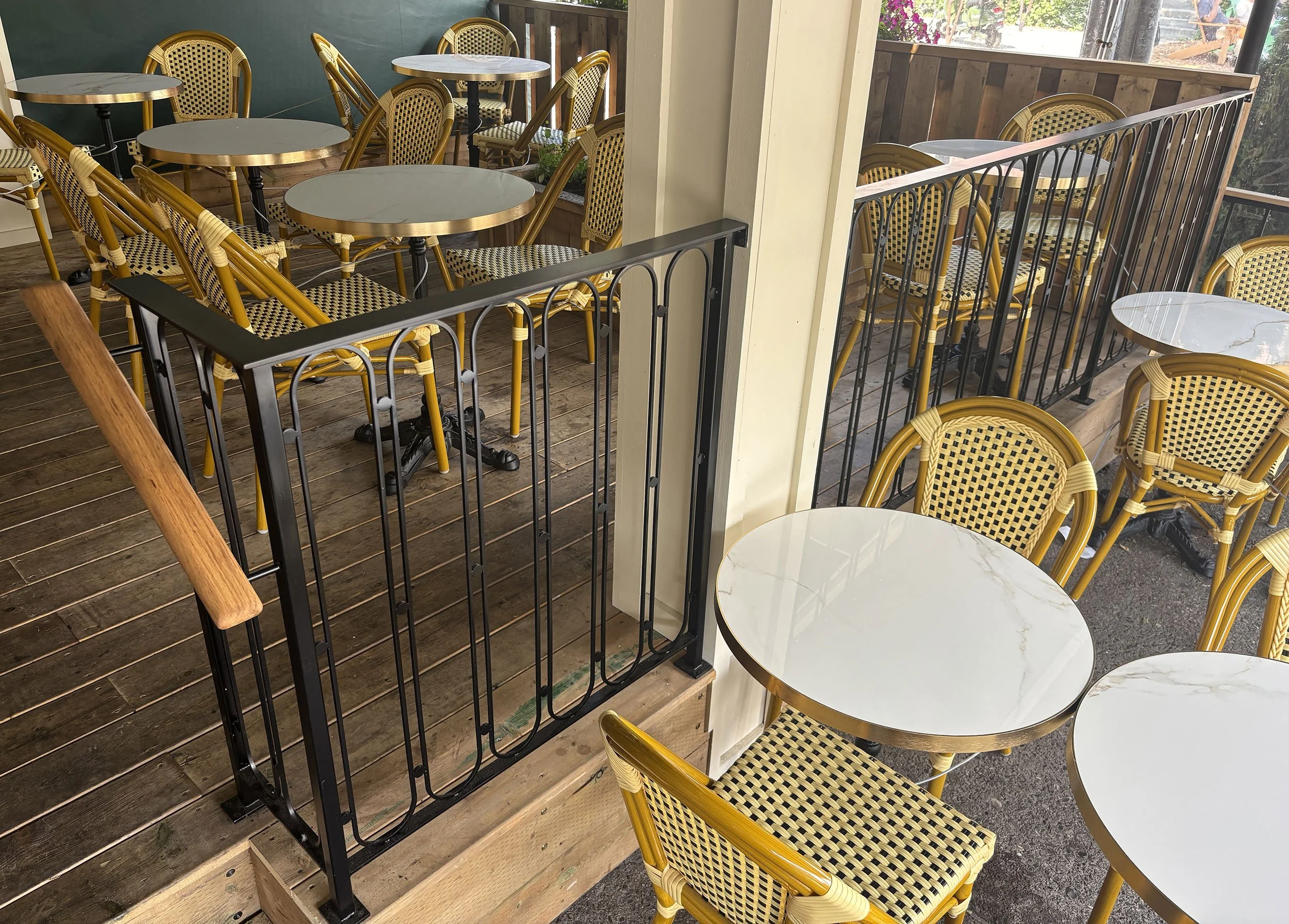Patio at Brasserie Côte featuring custom railings designed and fabricated by McWood.
