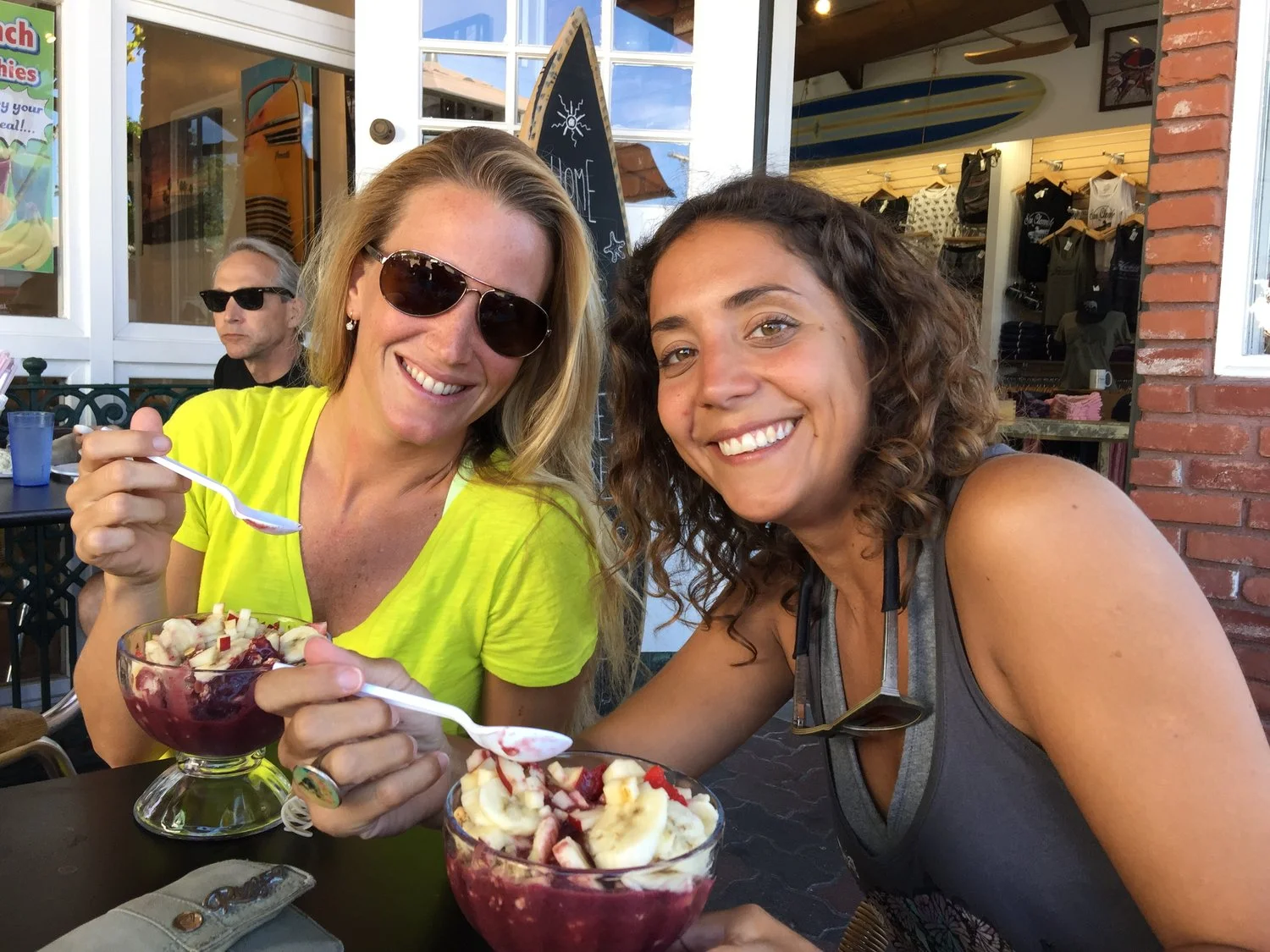 You'll enjoy healthy delicious food at one of the many cafes and restaurants in San Clemente (Surf shop in the background)
