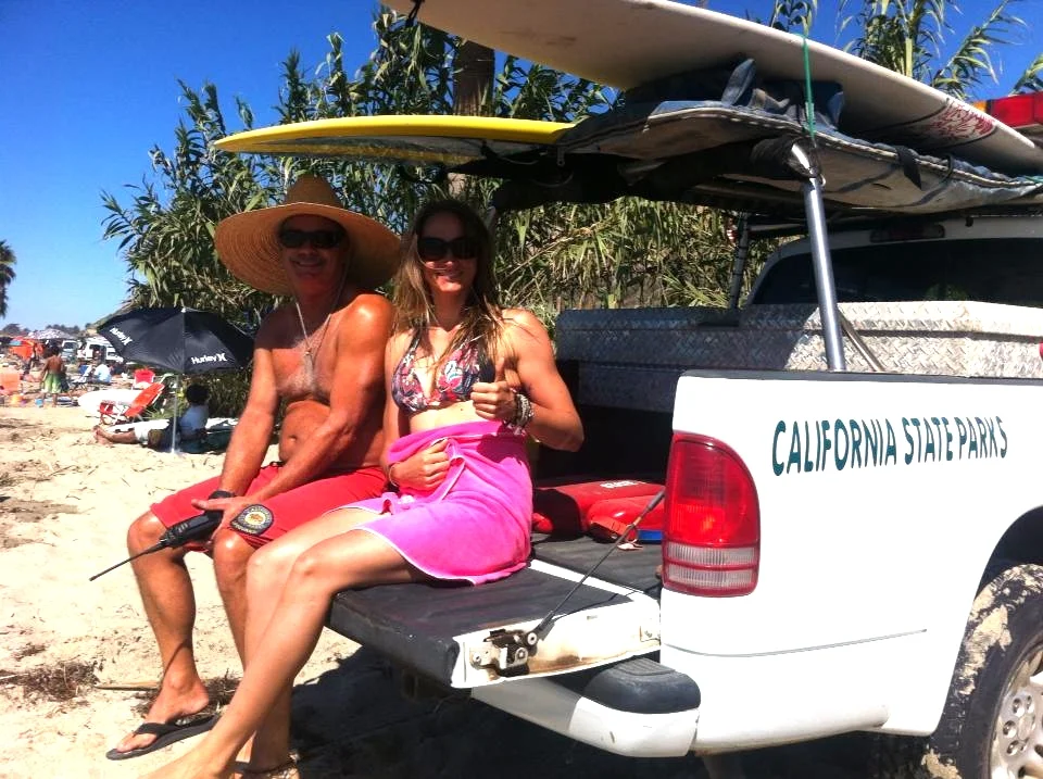getting some shade with a california lifeguard after surfing famous and perfect san onofre!