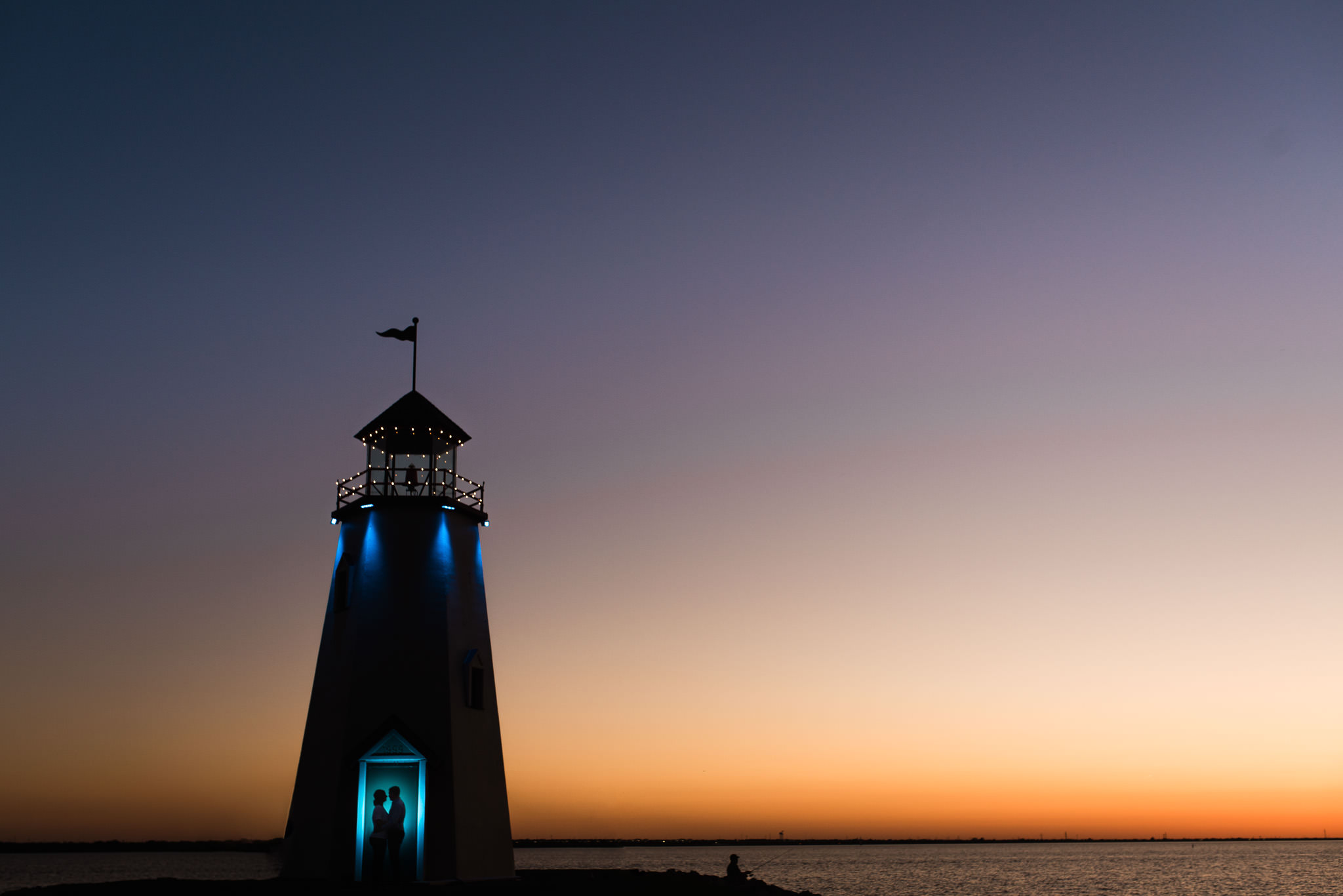 engagement photo at lake hefner lighthouse