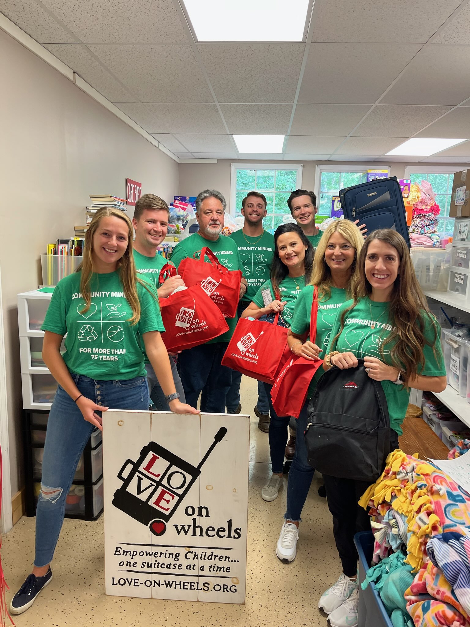 September 2022: Two groups from Benesch Company volunteered to wrap blankets, pack duffels, make Care Bags, and organize donations.