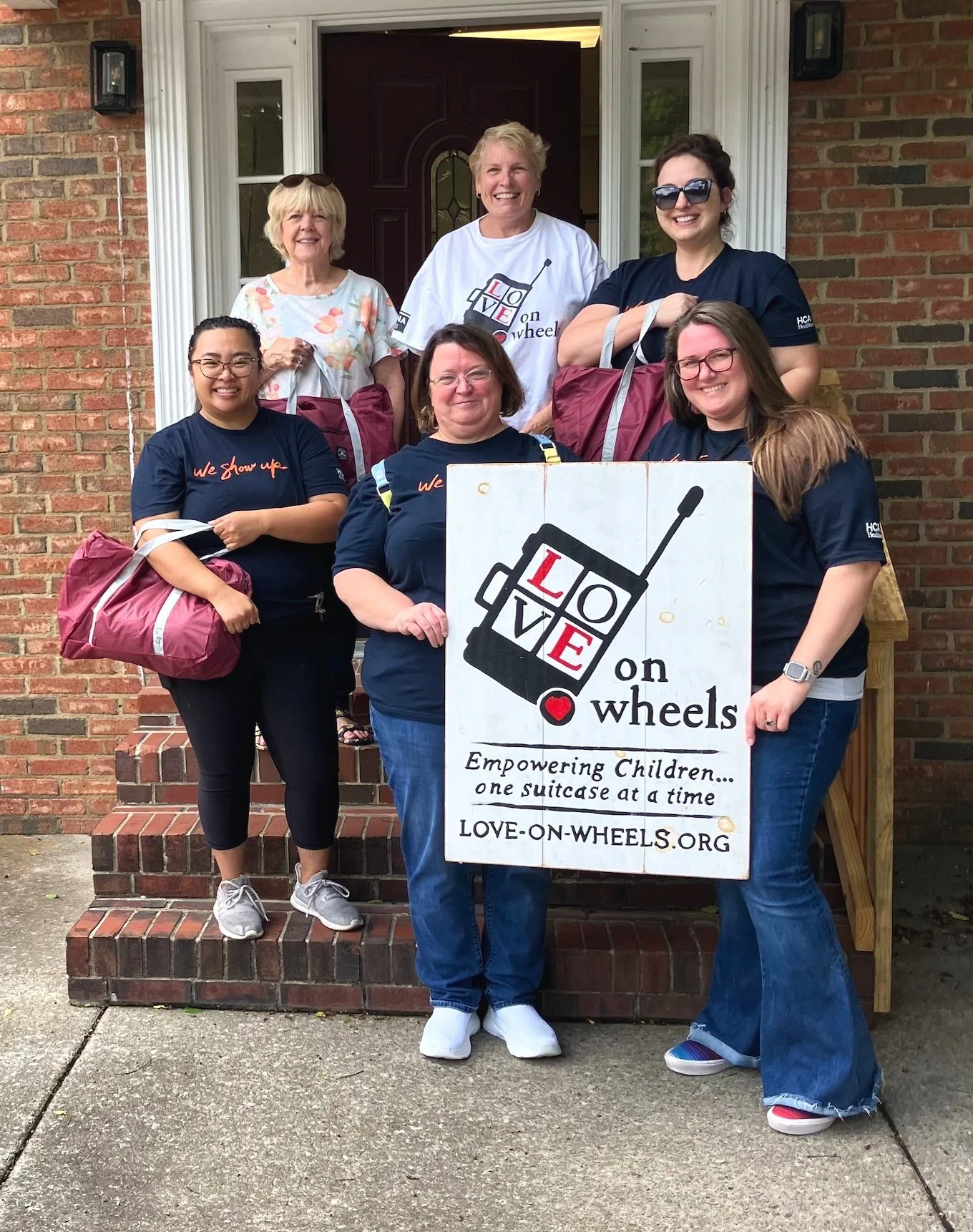 Corporate Women Leading with Heart: 200 Bags Packed and Headed to East Tennessee