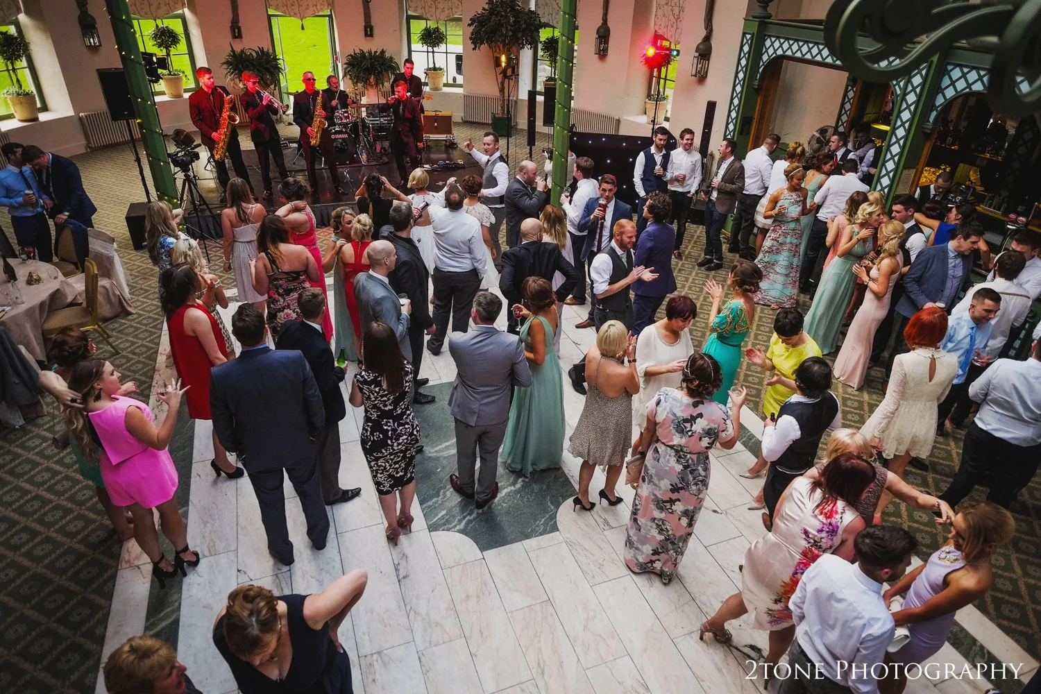 Everyone takes to the dance floor with the bride and groom, dancing to the fantastic Hip Operation. It was a fab surprise to see the new addition to the band, one of our groom's from 2011 who married Rachel at the Bowes Museum playing the trumpet.
