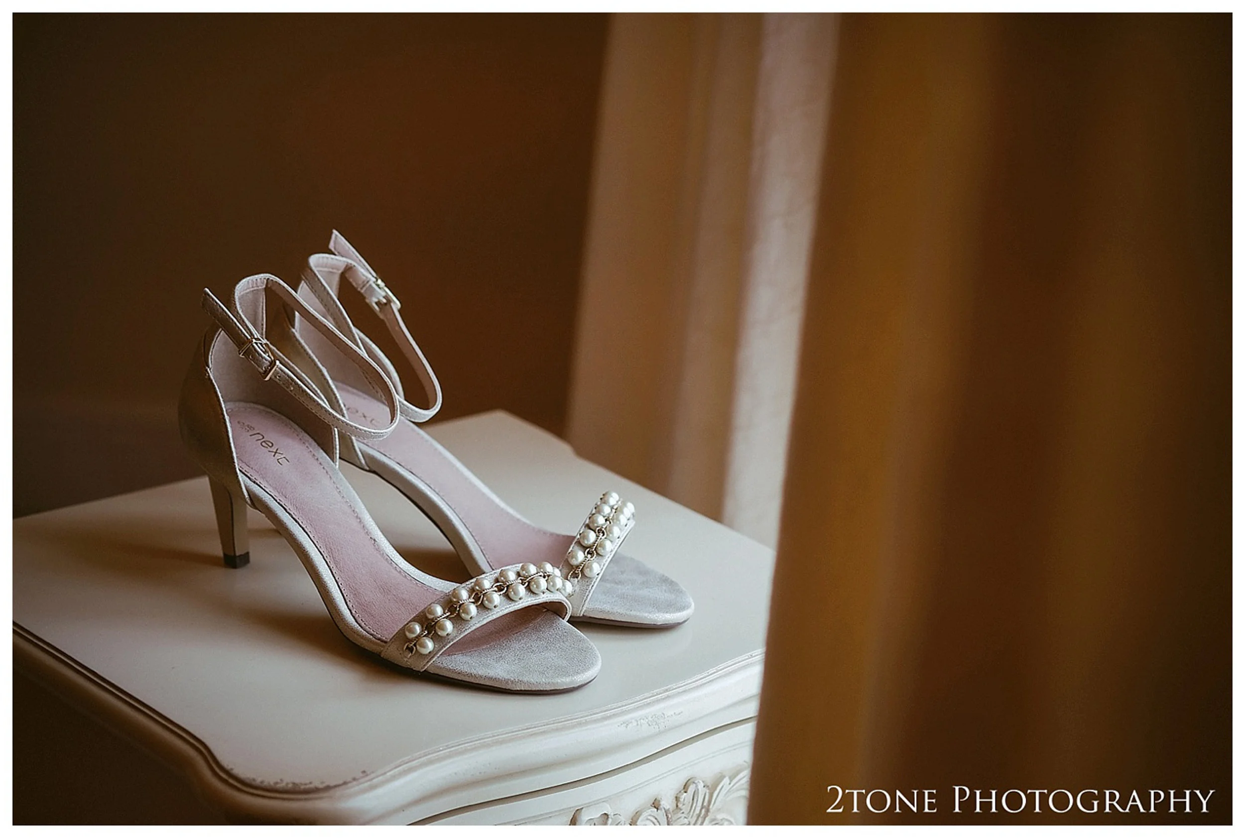 Bridal preparations. Eshott Hall wedding photographs by wedding photographers based in Durham and the North East. www.2tonephotography.co.uk.