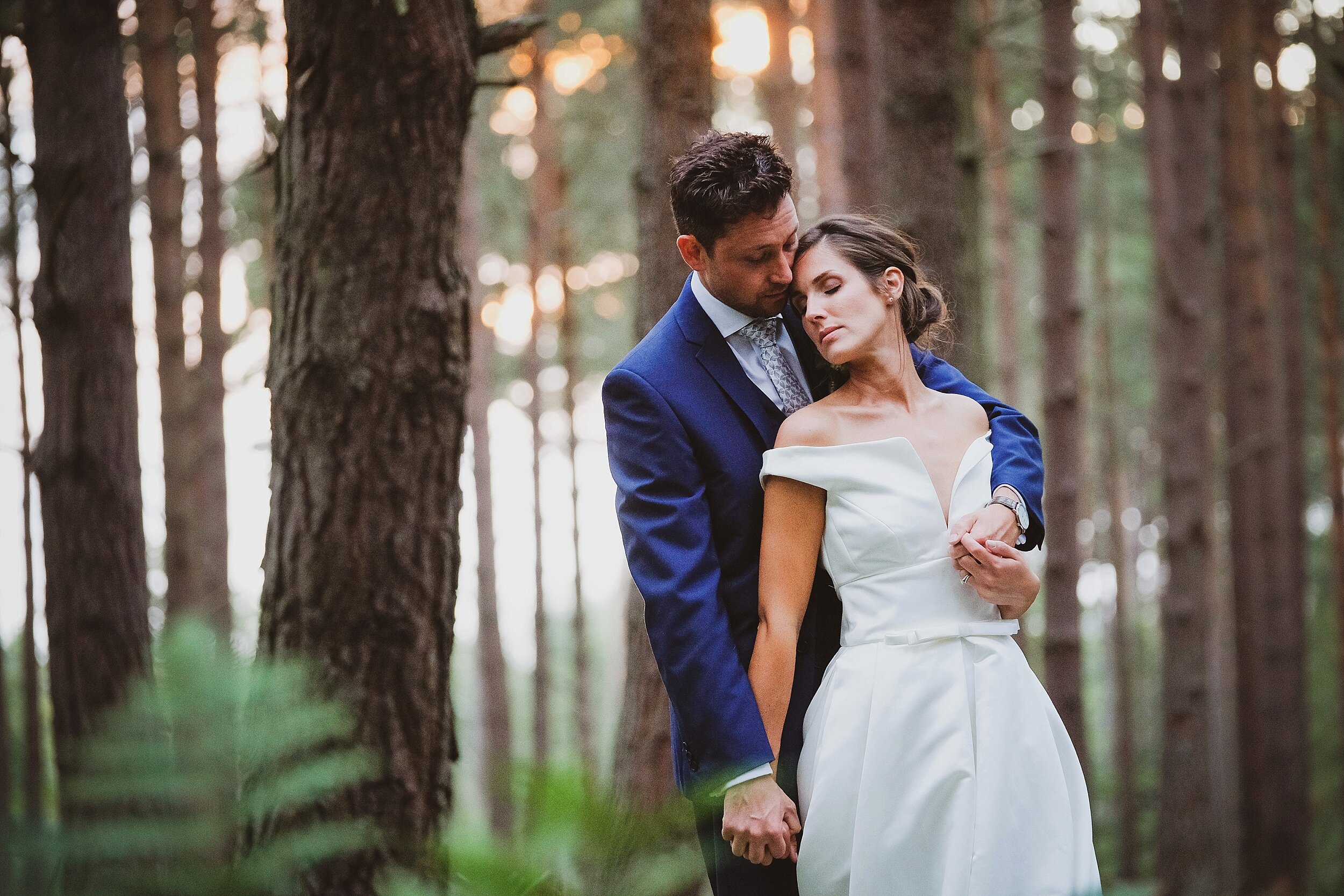 Healey Barn wedding - bride and groom in the woods