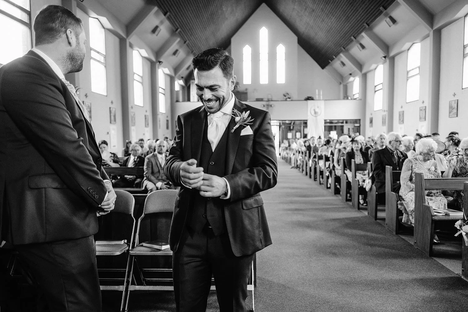 healey-barn-wedding-groom-at-church