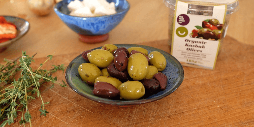 Real Olive Co. Olives in a snack pot