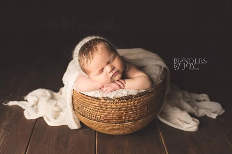 Sleeping-baby-in-basket.jpg