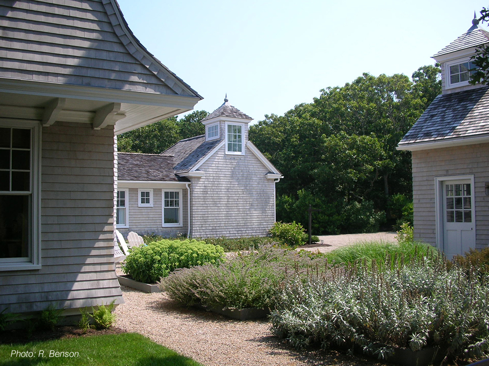 This one-acre plus property offers beautiful views of Cape Cod Bay surrounded by the traditional pitch pine and scrub oak vegetation. The client and CBA established a set of primary goals for this new house, which were to capture these views, maintain the visual privacy of the house, protect the surrounding woodland, incorporate a lawn for children, and create an elegant, yet simple setting for this home.