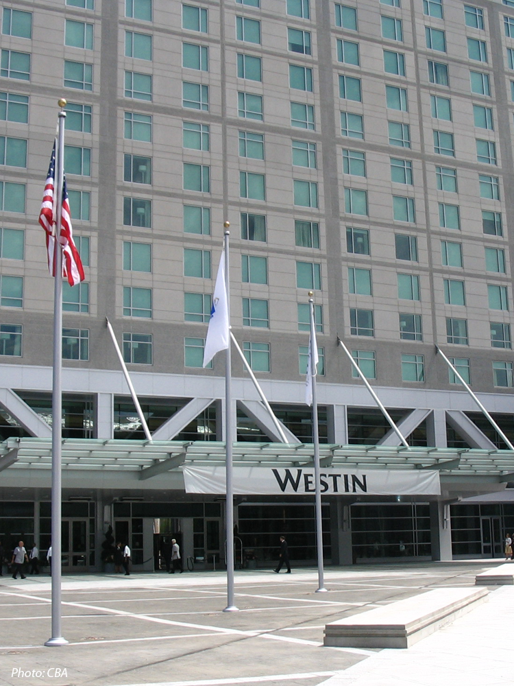 This hotel was built to service the city’s new convention center in South Boston. The siting of the hotel provided the opportunity to create a new urban plaza, which is linked to the Convention Center through the use of bold paving patterns and raised planters. A wide band of landscape steps connect Summer Street to the plaza and the hotel’s main entrance. New streetscapes were designed along Summer and D Streets.