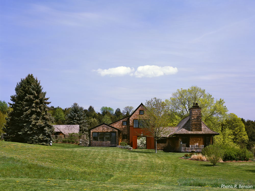  The architecture of this home, a contemporary interpretation of a classic farm complex, reflects the history of the site while looking to the future. The landscape responds to this by using local stone, a simple plant palette, and the remnants of ol