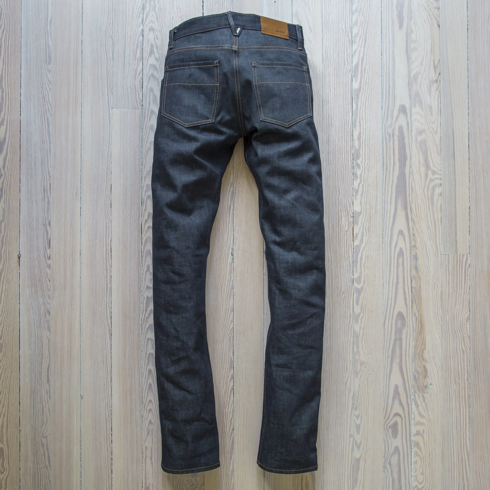 1420108_002_FLAT_MENS_PANTS_JONES_211_SELVAGE_RAW_WOOD_FLOOR_4bee88da-b8ed-4271-8886-0c409f0afc7e_2048x.jpg