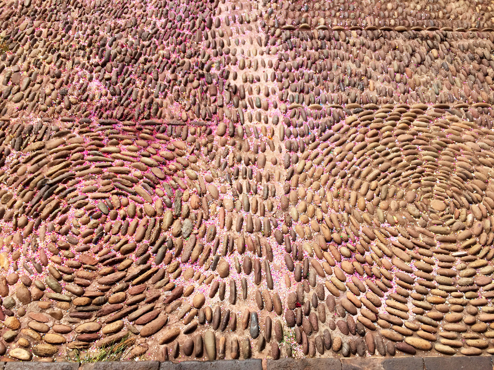  Stones in the plaza of village Andahuaylillas. The confetti is from a wedding celebration from the night before. 