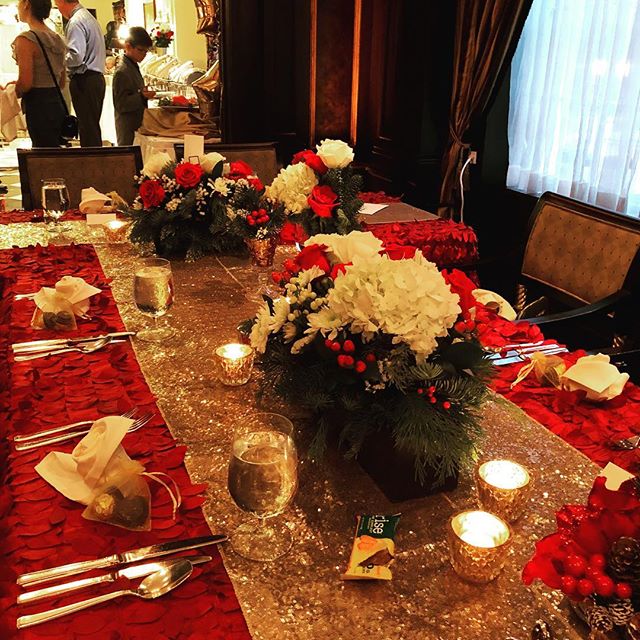 Some arrangements I made for a friend&rsquo;s wedding. They were made out of Christmas greens , roses, white hydrangeas and winterberry. The room was gorgeous!