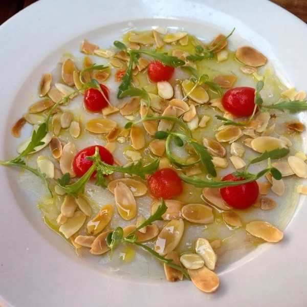  Long Island fluke, pickled tomatoes, almonds andmanni olive oil -- phenomenal, but light/small.... 