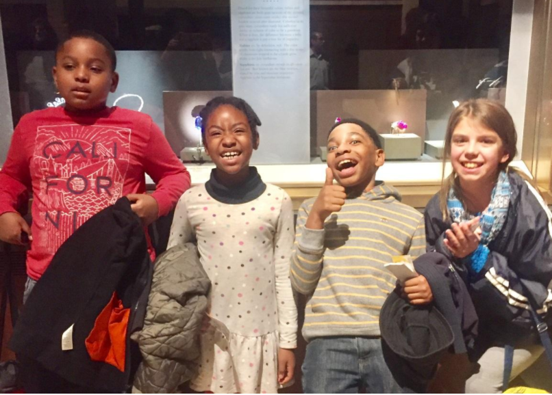 Kyle, Kristina, Aqeel, and Kristina in front of the Carmen Lucia Ruby