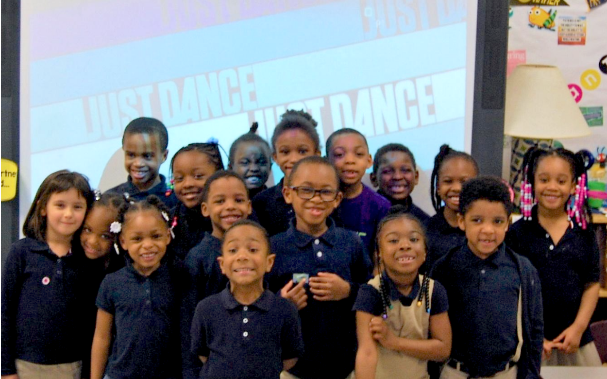 Mrs. Graves and Ms. Chappelle’s Kindergarten Class pose after having a “Just Dance” movement break.