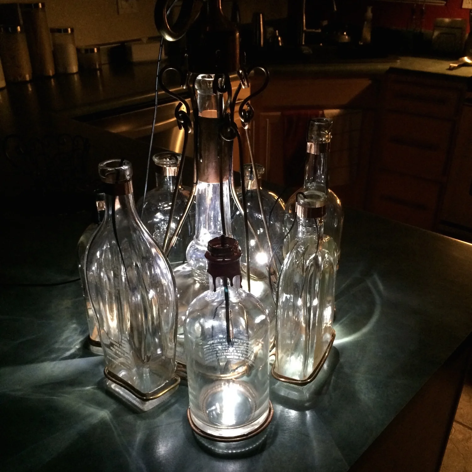 Bourbon Bottle Chandelier - Bluetooth, Dimmable, Hand-crafted