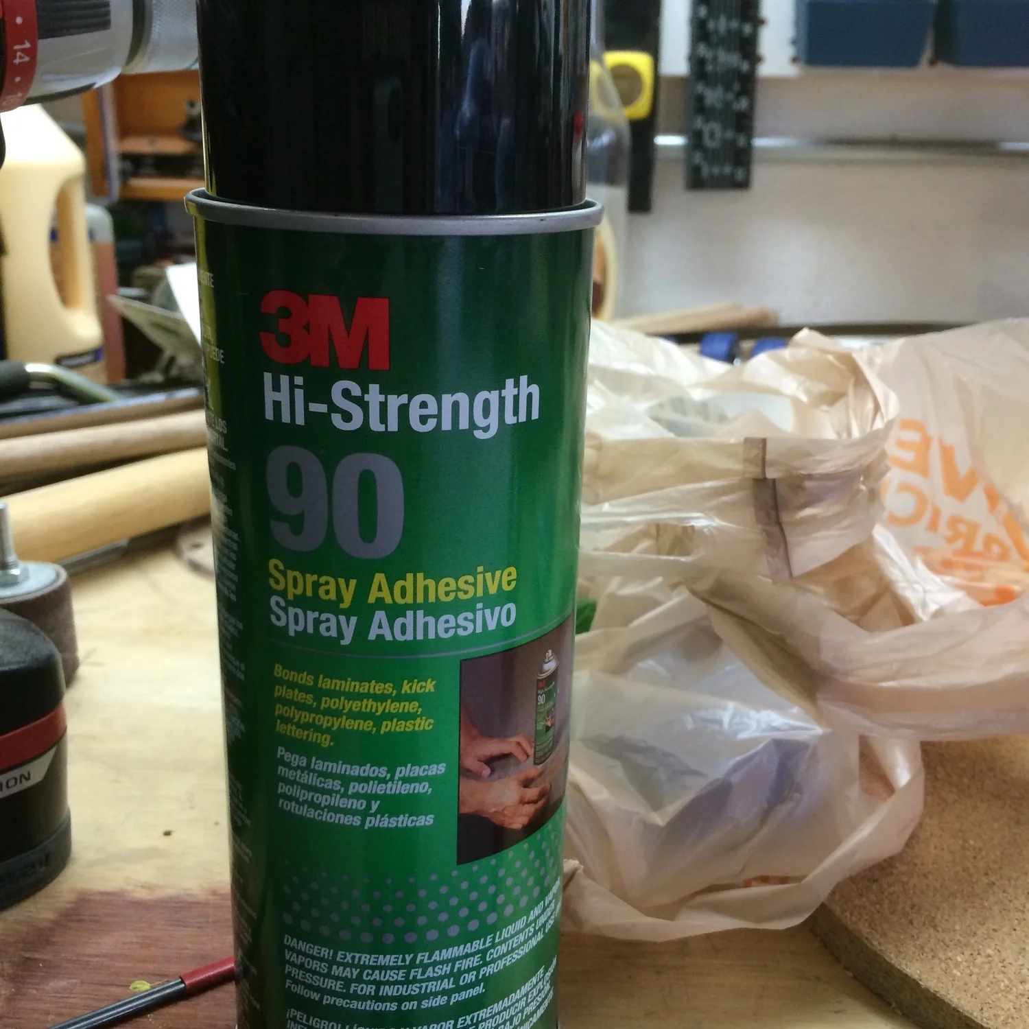 Favorite old standy-by spray adhesive from 3M to stick the felt to the cork board