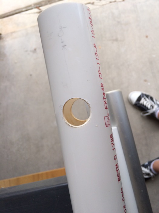 7/8" hole drilled completely through 1-1/2" PVC pipe