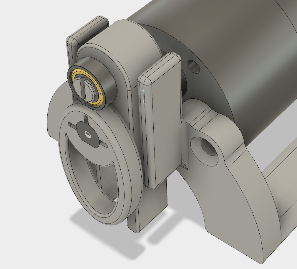 Follower straddles motors shaft and has two guides to keep it upright through full cam follower travel