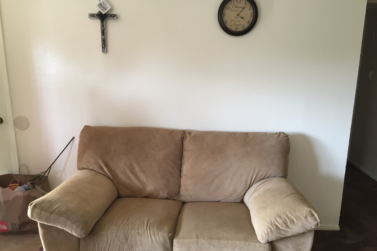 a love seat donated by a couple