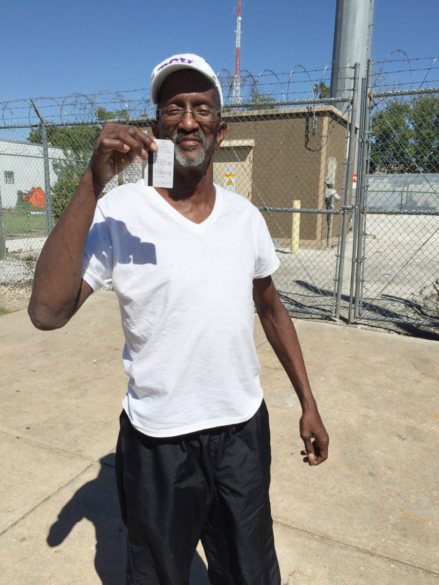 Randy with his month-long bus pass that will take him back & forth to treatment for his prostate cancer.
