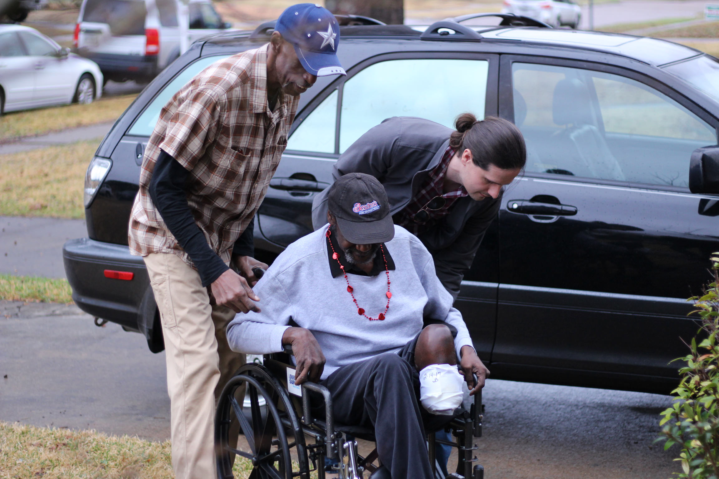 Edward and Nick helping Sam