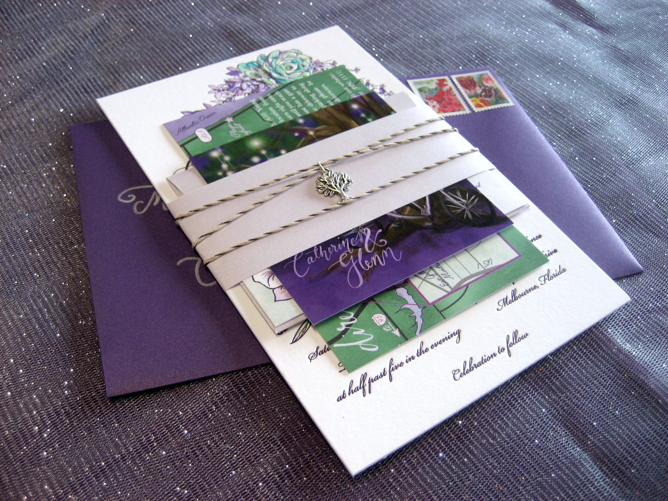 Letterpress invitations with hand painted watercolor & rhinestone detail. Custom map, calligraphy, and art. Fan style programs for outdoor weddings! From Proton Paperie & Press.